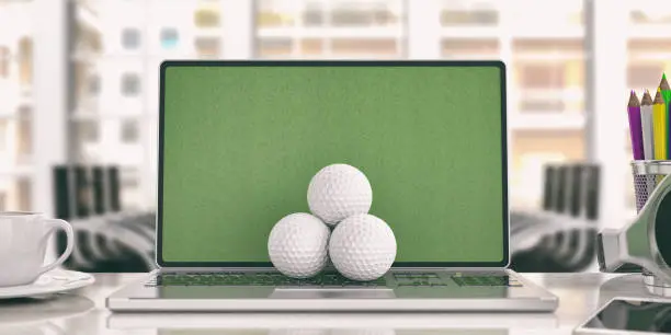 Photo of Golf balls on a laptop - office background. 3d illustration