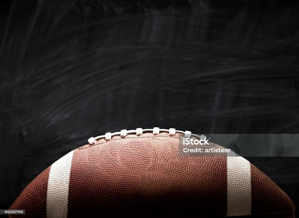 American. American football ball on background American Football - Ball Stock Photo