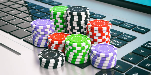 istock Casino chips on a laptop. 3d illustration 1022318258