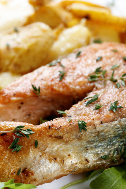 istock Roasted  salmon with  potatoes. 1022318740