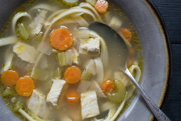 istock homemade chicken soup with vegetables 1022325096