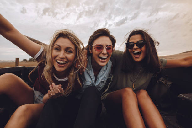 istock Friends having a great time on country road trip 1022336640