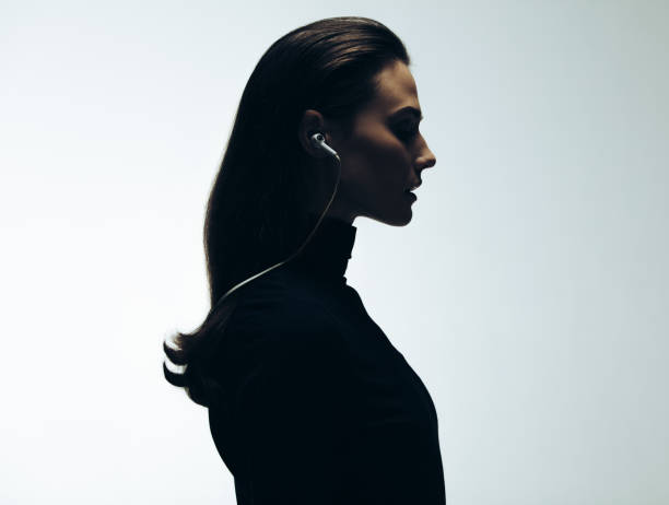 istock Silhouette of young woman in studio 1022345220