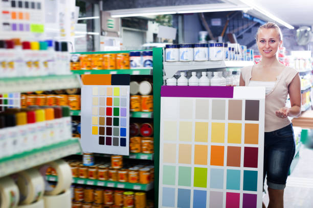 istock Cheerful woman picking color for paint 1022347532