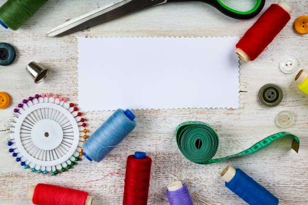 istock Sewing accessories and paper 1022352288