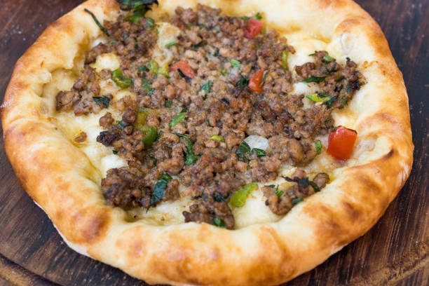 istock Turkish Round Pide with Meat Kiyma and Cheese. 1022368102