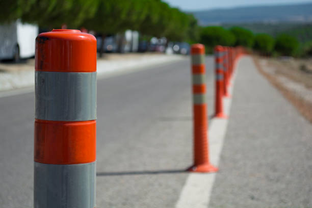 istock traffic warning cone in row to separate route in road area 1022368738