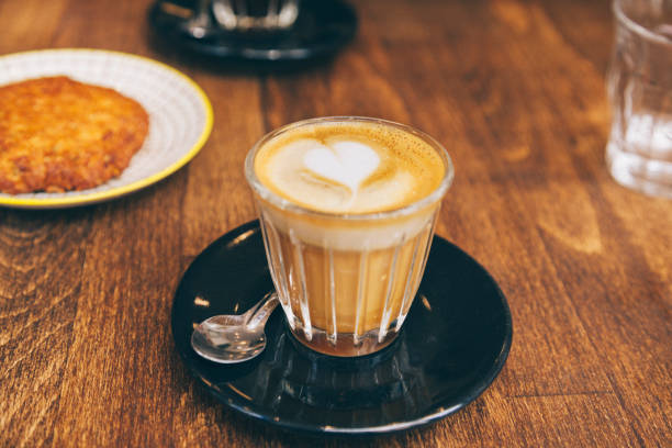 istock Coffee break - coffee and cookie on a wooden table 1022368748