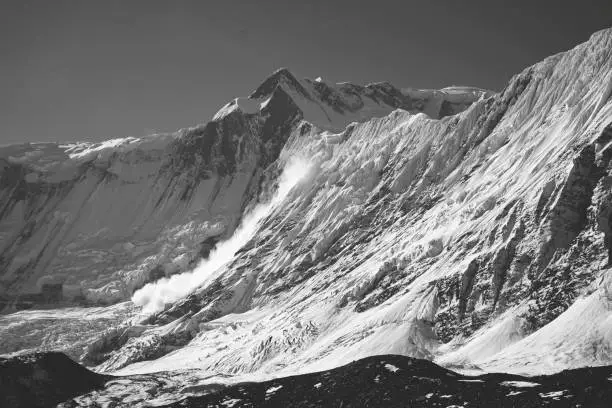 Photo of Avalanche falling down Himalayan mountain