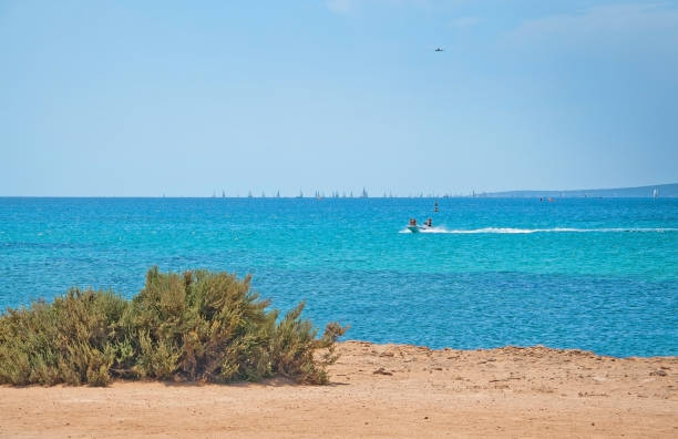 istock Seascape with rocks and boat 1022379830