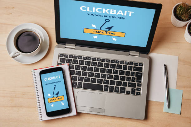 istock Clickbait concept on laptop and smartphone screen 1022382752