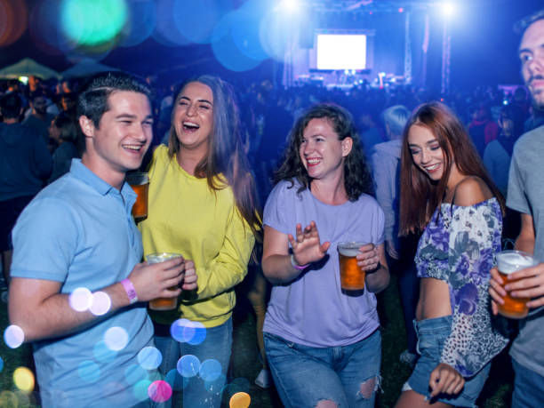 istock Friends enjoying a concert 1022383412
