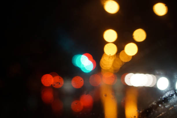 istock colorful street circle bokeh light dark background 1022386162