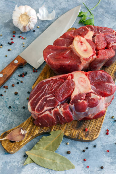 istock Two pieces of raw beef shank and spices. 1022386534