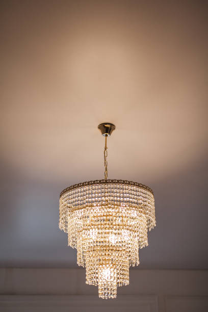 istock beautiful crystal chandelier in a room. Copy space 1022397426