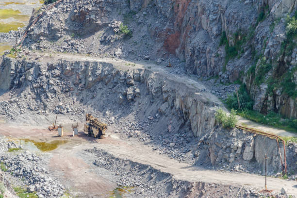 istock Extraction of mineral resources in the granite quarry 1022416332