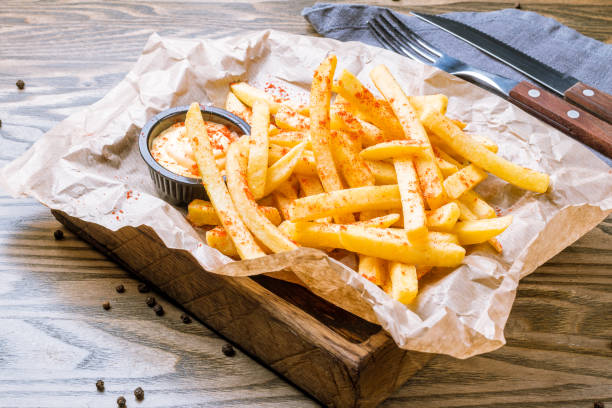 istock French fries with cheese sauce 1022421092