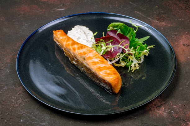 istock Salmon steak on the grill 1022439004