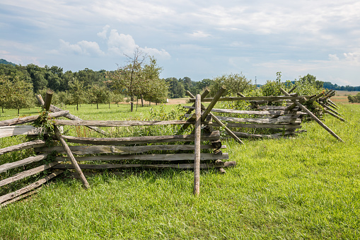 A split-rail fence or Worm fence (also known as a zigzag fence or snake fence) on the Gettysburg Pennsylvania battlefield.