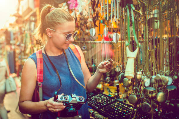 istock Woman discover souvenirs market while travelling 1022456882