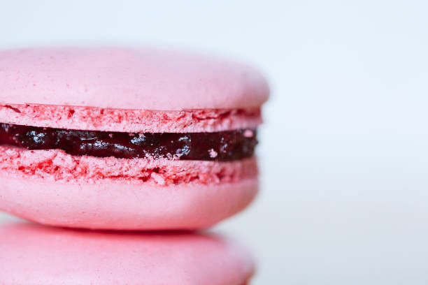 istock French cookies macaroons with strawberry 1022457162
