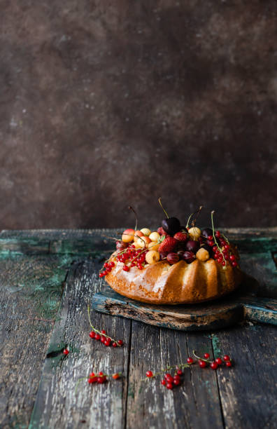 istock appetizing cake with strawberries and currants on wooden table 1022462472
