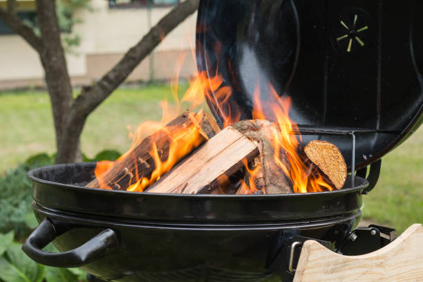 istock black charcoal grill burning with firewood 1022500794