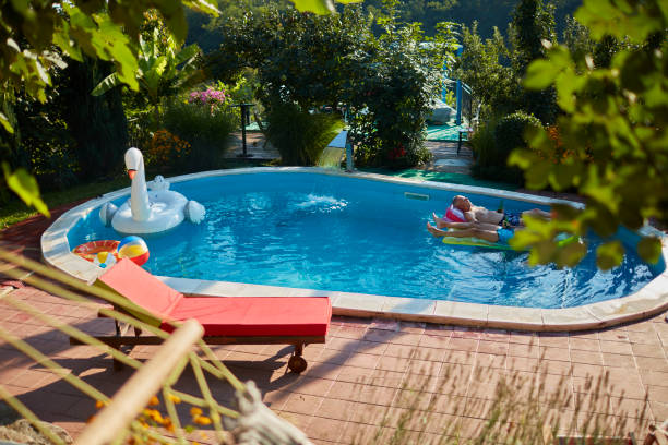 istock Senior Friends Pool Fun 1022503516
