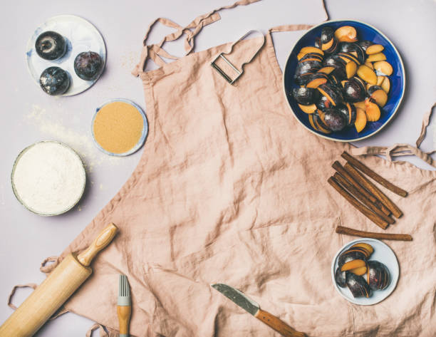 Baking ingredients and tools over pastel background, copy space