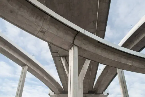 Architecture lines under the bridge, Elevated expressway,The curve of bridge in Bangkok, Thailand.