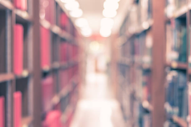 istock Blur school library or study room with book shelves for education background 1022551634