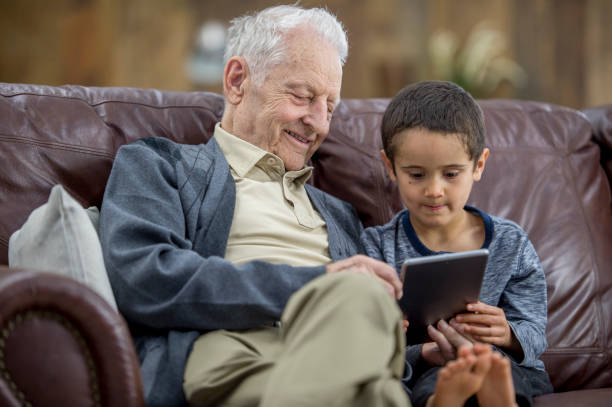 istock Grandfather with his grandson 1022562394