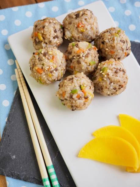 Asian food rice balls and pickled radish