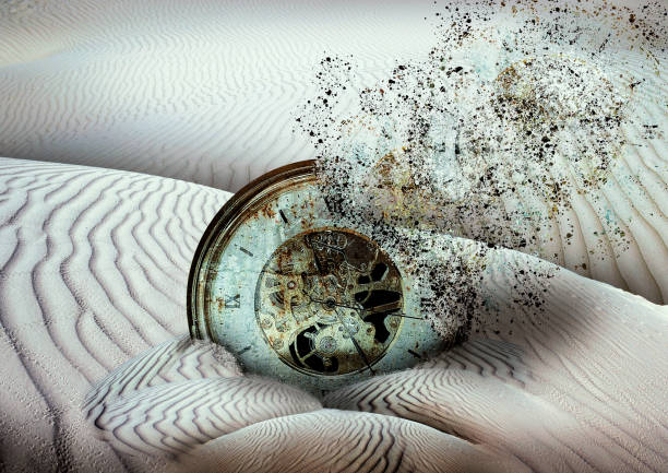 ancient clock disintegrating buried in desert sand ancient clock disintegrating buried in desert sand, end of time Armageddon Bible stock pictures, royalty-free photos & images