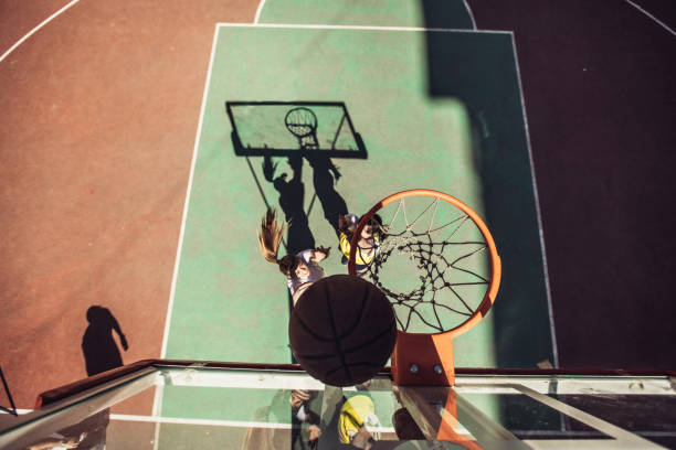 istock Streetball duel under the hoop 1022595302