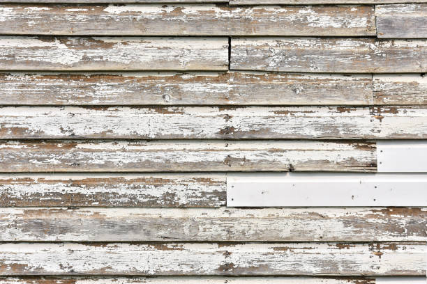 istock Old Weathered Wood and Peeling White Paint 1022599464