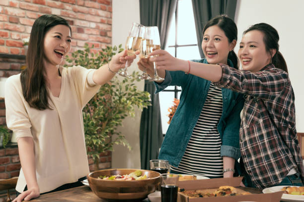 istock girls standing up celebrating together 1022600072