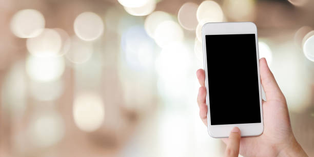 istock Hand using smart phone with blank screen over blur bokeh light background, business and technology, internet of things concept 1022602586