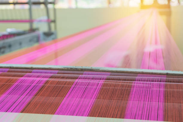 istock Weaving loom and shuttle on the warp 1022607866