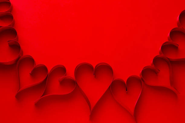 istock Image of affection Red background and ribbon and heart 1022625190