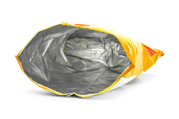 Potato chips bag isolated on white background. Inside of leftovers snack packaging.