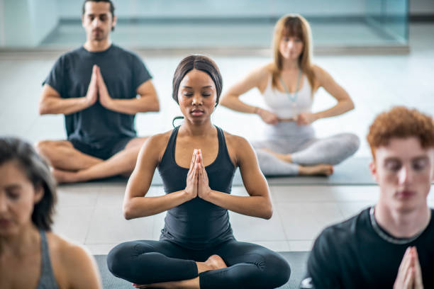 istock Meditation in a yoga class 1022651850