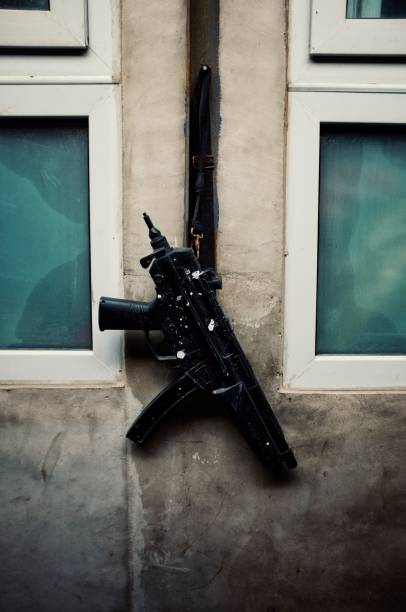 istock gun hanging outside of a kitchen window 1022659056