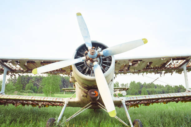 istock the old plane stands on the field 1022670042