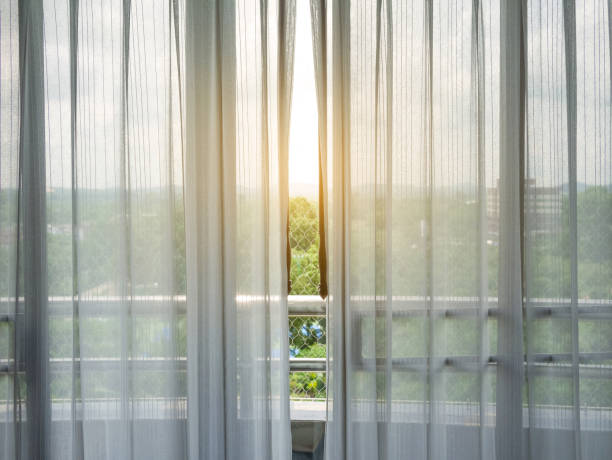 White sheer curtains and balcony with high angle view