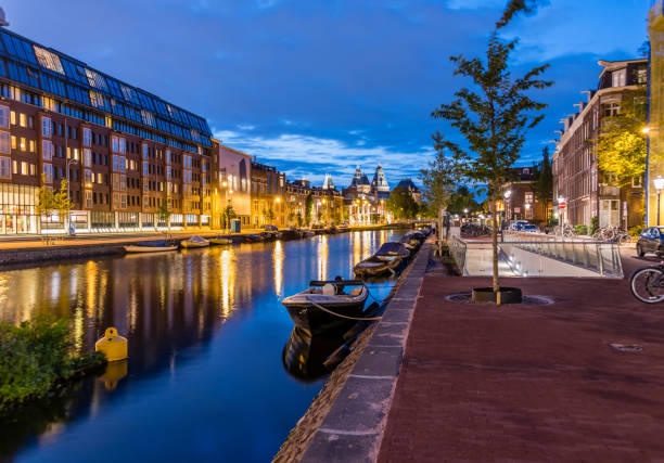 istock Night Along a Canal in Amsterdam Netherlands 1022691096