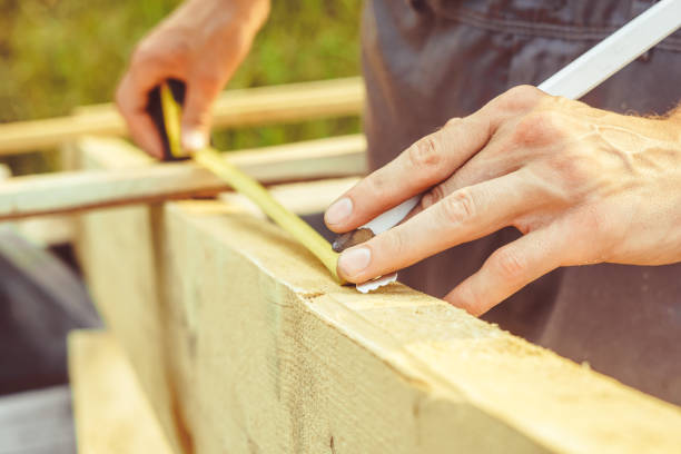 istock the worker makes measurements with a tape measure 1022694338