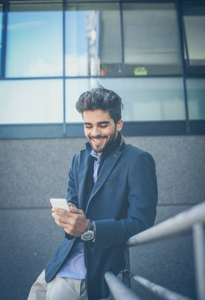 istock Checking the deal over the phone. 1022699308