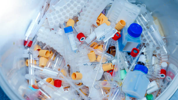 Medical hazardous laboratory waste Pile of Microcentrifuge Tubes - Medical Plastic toxic waste stock pictures, royalty-free photos & images