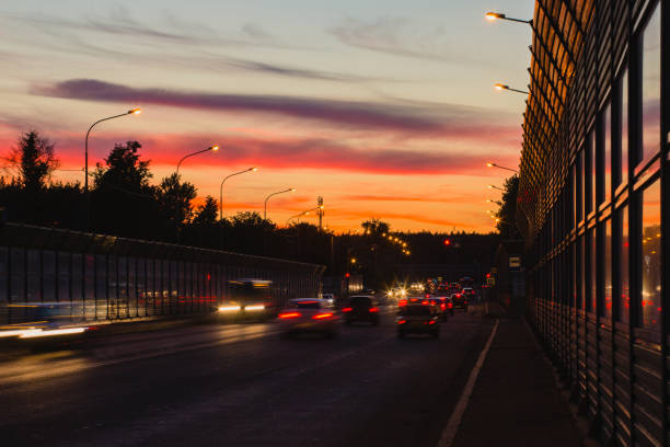 istock Summer landscape with highway and tracks from car headlights 1022720312
